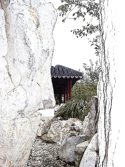 Whether we are looking out of a mountain grotto - or into one - like this one in the Dunedin Chinese Garden " Lan Yuan."