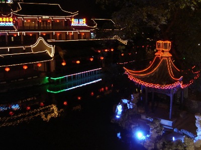 Looking down into the side of that same pavilion, with Taihu rocks lit up beneath.