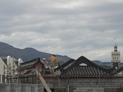 Up at this height, we can observe - not only the beautiful Chinese architecture in the foreground; but also the borrowed scenery of the hills in the distance and as a gentle reminder - the CityScape, to remind us why the Chinese garden is located where it stands?