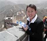 Chinese translator, going about her work in a dedicated and happy manner.