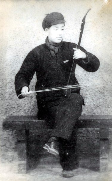 Erhu - life-long player of this Traditional Chinese musical instrument, Mr. Zhang - photo courtesy of his daughter Ms Zheng Xiaofeng.