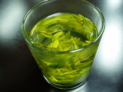 A glass of freshly made Green tea.